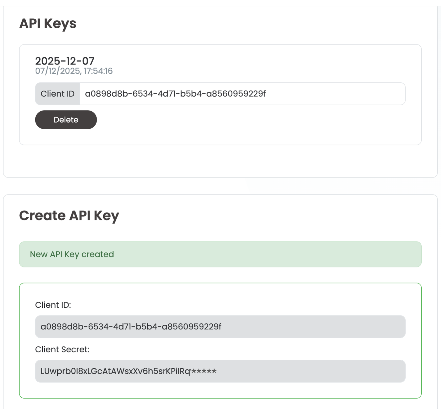 The same screen right after creating a key: „New API Key created“, with the client ID and the client secret shown once